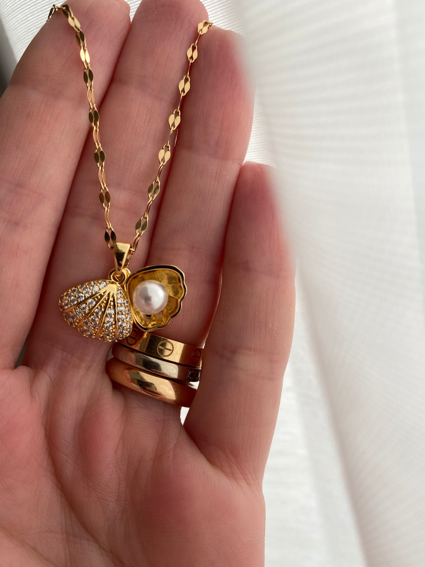 Muschelkette in Gold